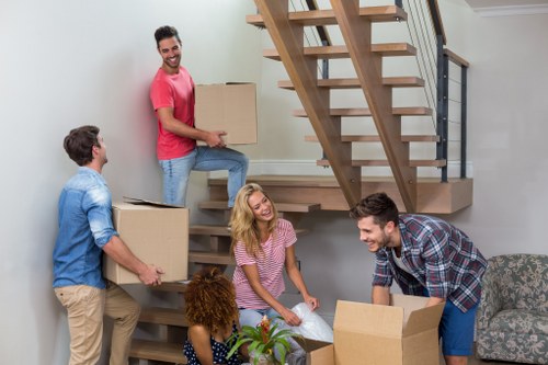 Packed boxes and furniture prepared for a Waterloo home relocation