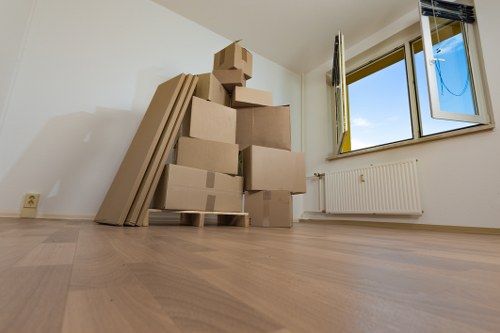 Local house movers transporting belongings for a home relocation