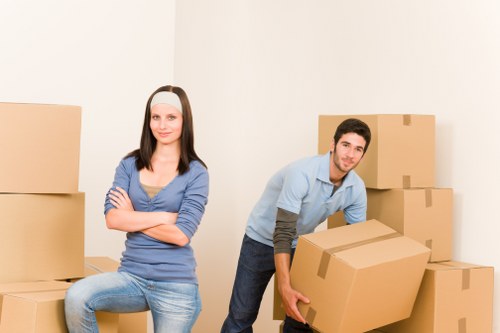 Packed moving boxes and furniture ready for a Waterloo house removal