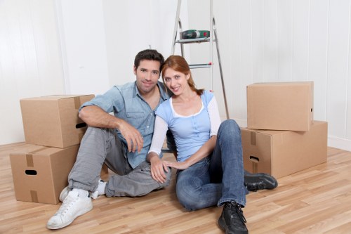 Unpacking assistance helping a family settle into a new Waterloo home