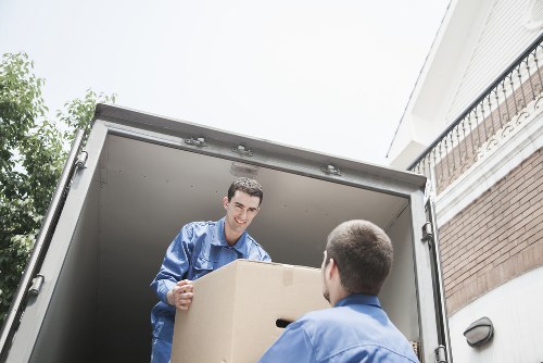 Packed boxes and furniture ready for house removals in a Waterloo flat
