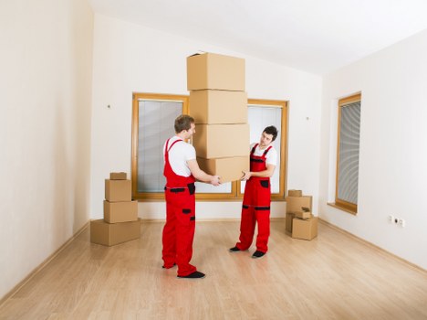 A moving team planning a house move in Waterloo